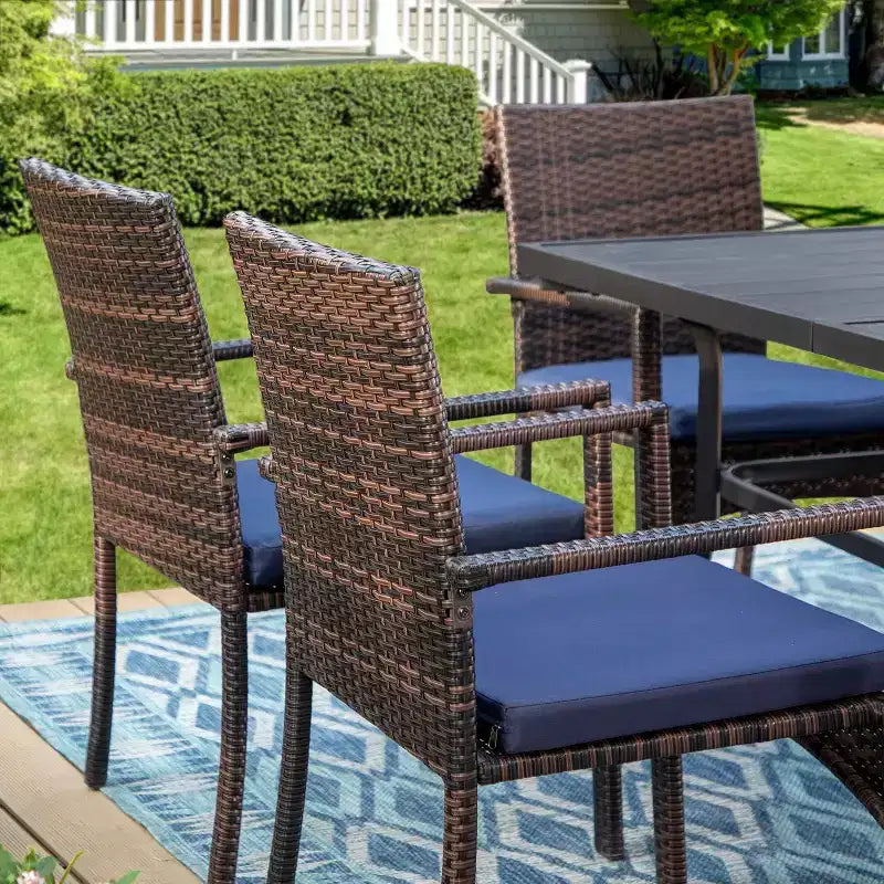 Set da pranzo da 7 pezzi per patio con tavolo rettangolare con foro per ombrellone da 2,6" e poltrone in vimini e rattan - Nero - Captiva Designs