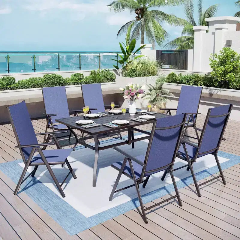 Set da pranzo da esterno Captiva Designs 7 pezzi con tavolo rettangolare a doghe e sedie a sdraio pieghevoli