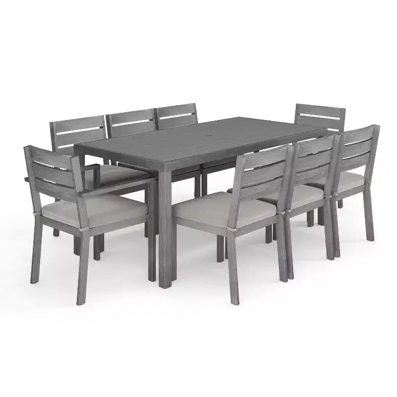 Set da patio Martha Stewart Bedford per interni-esterni con tavolo da 71 pollici e 8 sedie da pranzo con finitura in alluminio spazzolato effetto legno e cuscini per seduta resistenti alle intemperie