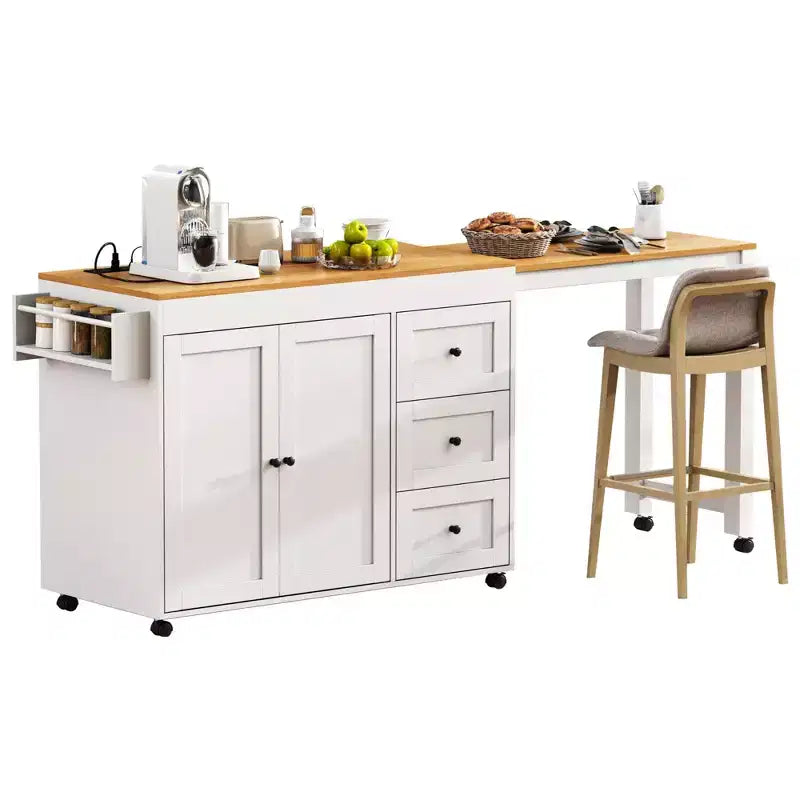 MAYEERTY Isola Cucina con Tavolo da Pranzo, 3 Cassetti, Presa Elettrica, Isola Cucina Rotante su Ruote con Porta Spezie e Mobile a 2 Ante per Cucina, Bianco