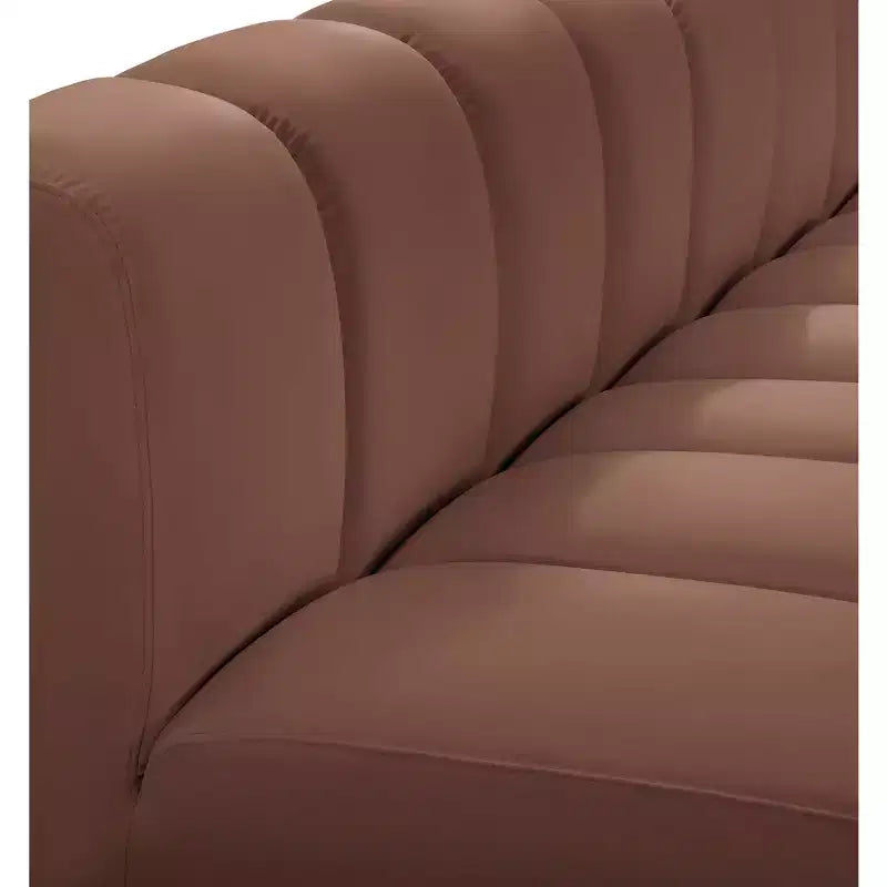 Meridian Furniture, divano modulare Arc in pelle vegana color cognac