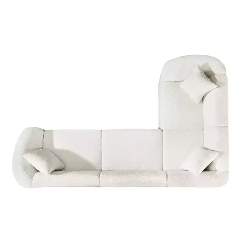 Divano Sezionale Curvo a L da 104 PolliciRivestimento in Bouclé Premium e Lusso Scultoreo a Quattro Posti per un Living Spazioso