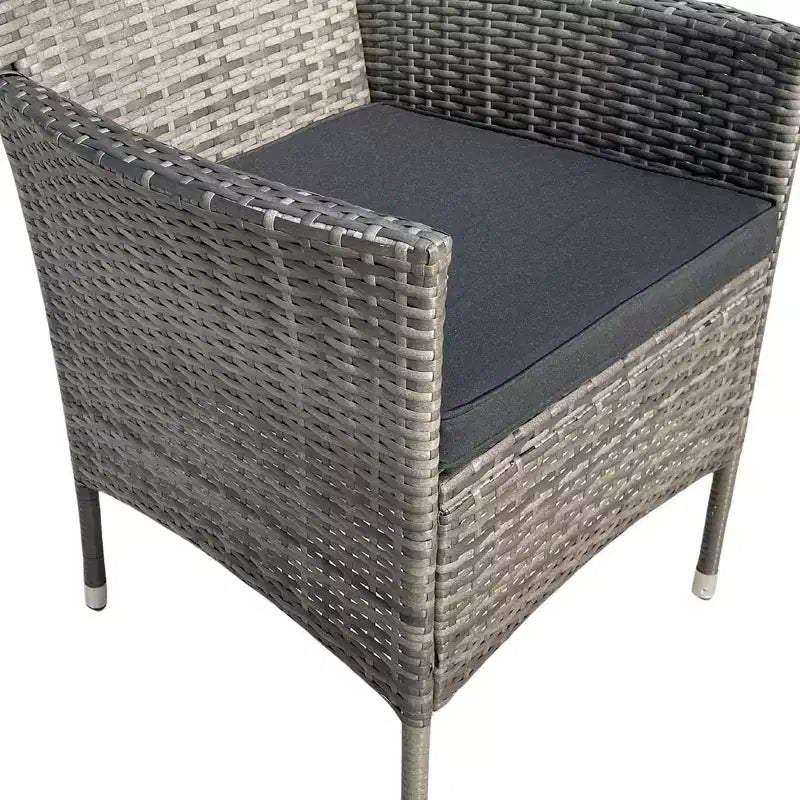 Set da pranzo da esterni GDFStudio Jayu Moderno a 9 pezzi in metallo e rattan sintetico con cuscino e tavolo con piano in vetro