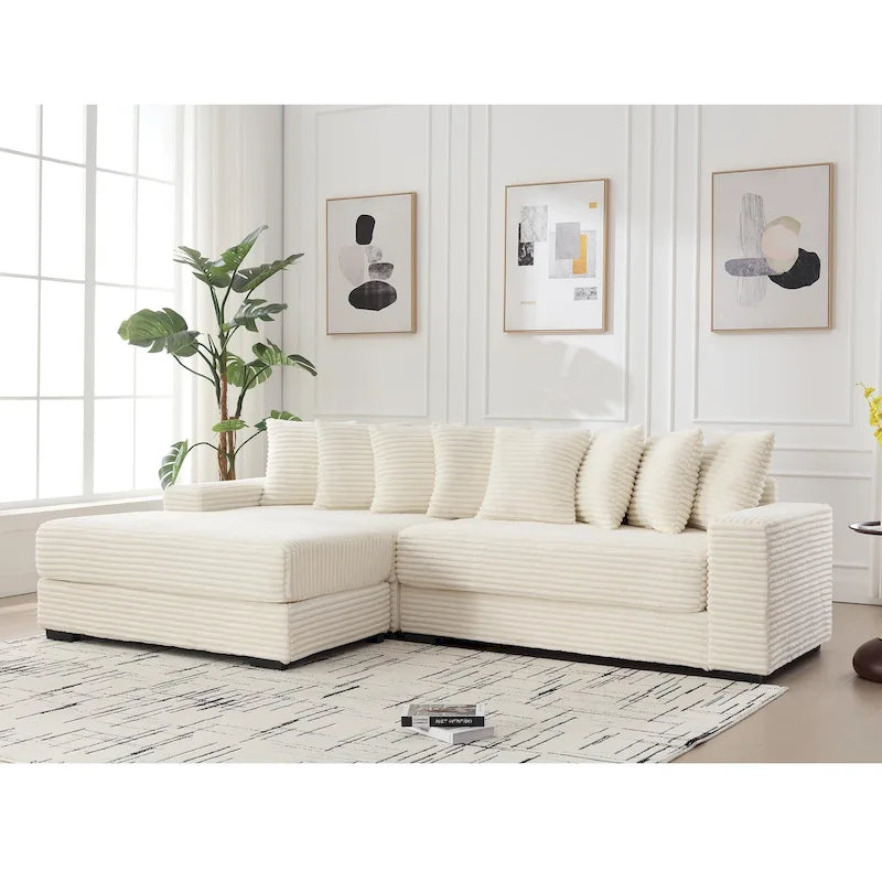 Divano componibile a L in velluto a coste beige 111 con chaise longue oversize sinistra e 8 cuscini decorativi