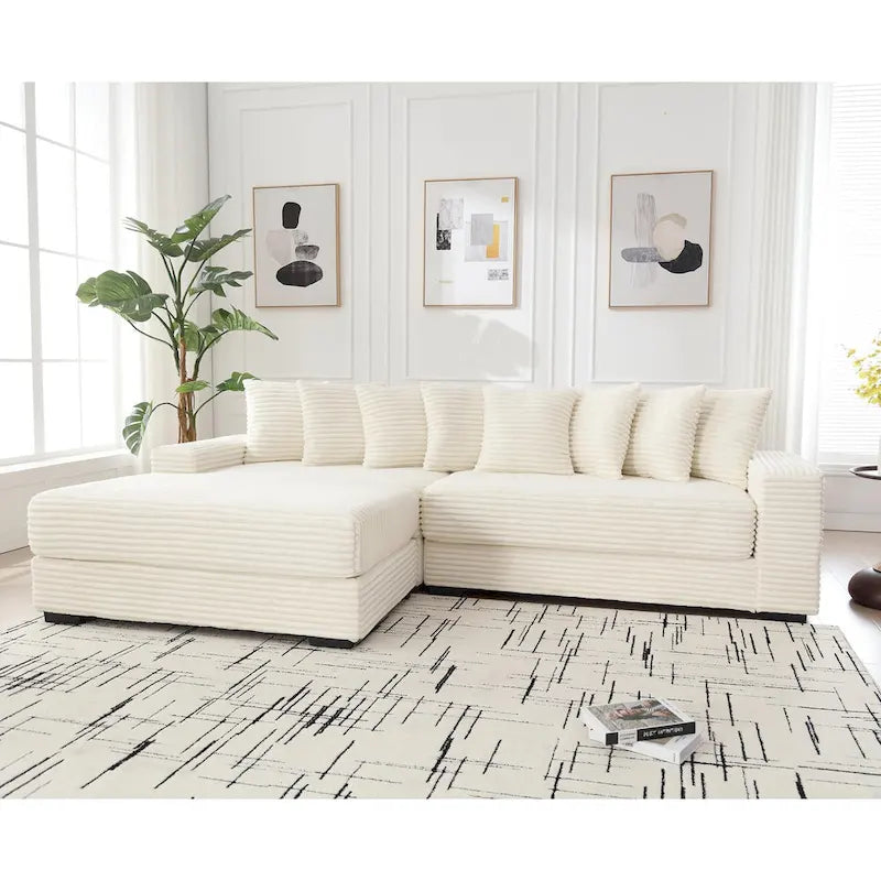 Divano componibile a L in velluto a coste beige 111 con chaise longue oversize sinistra e 8 cuscini decorativi