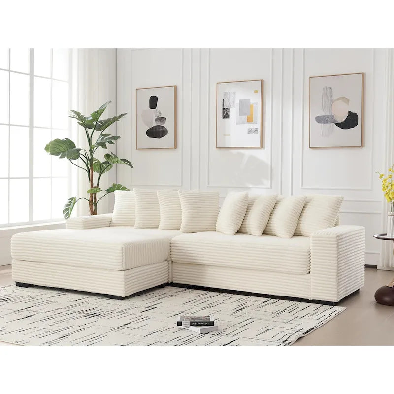 Divano componibile a L in velluto a coste beige 111 con chaise longue oversize sinistra e 8 cuscini decorativi