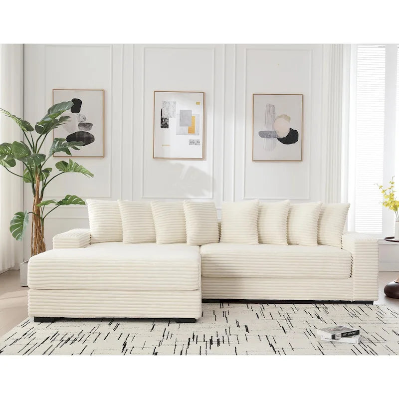 Divano componibile a L in velluto a coste beige 111 con chaise longue oversize sinistra e 8 cuscini decorativi