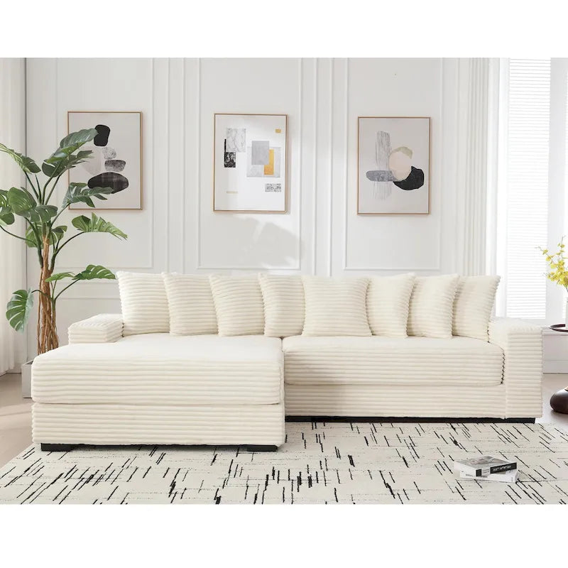 Divano componibile a L in velluto a coste beige 111 con chaise longue oversize sinistra e 8 cuscini decorativi