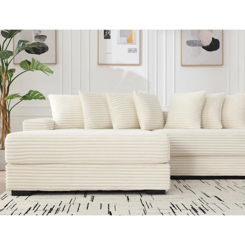Divano componibile a L in velluto a coste beige 111 con chaise longue oversize sinistra e 8 cuscini decorativi