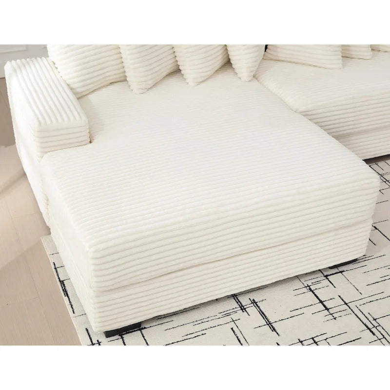 Divano componibile a L in velluto a coste beige 111 con chaise longue oversize sinistra e 8 cuscini decorativi
