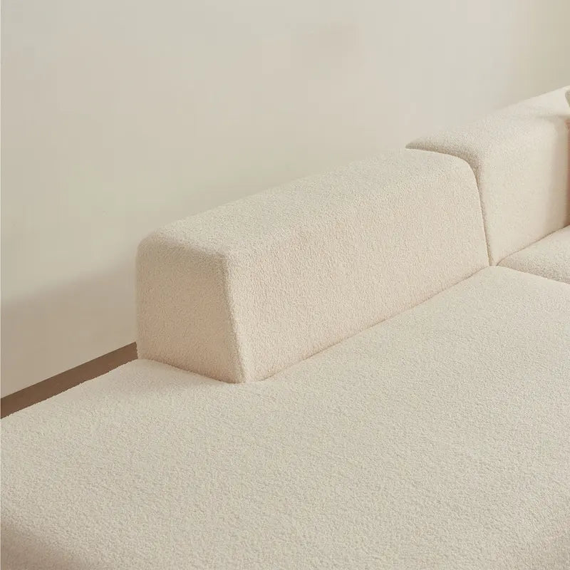 105.51 Divano componibile moderno a L con 5 posti e chaise longue, in morbido tessuto Sherpa "lana d'agnello"