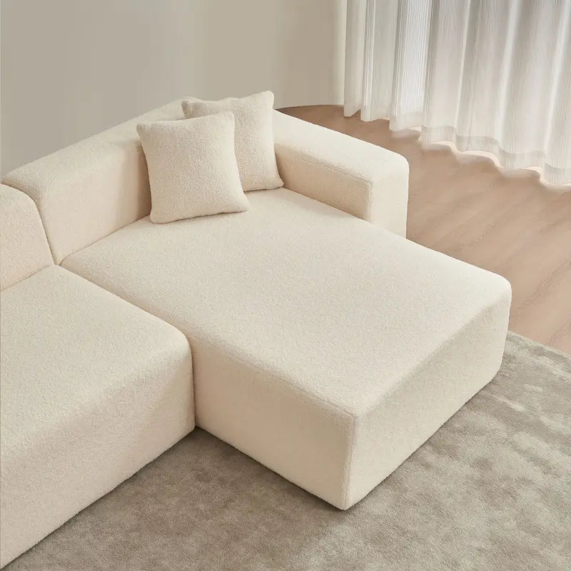 105.51 Divano componibile moderno a L con 5 posti e chaise longue, in morbido tessuto Sherpa "lana d'agnello"