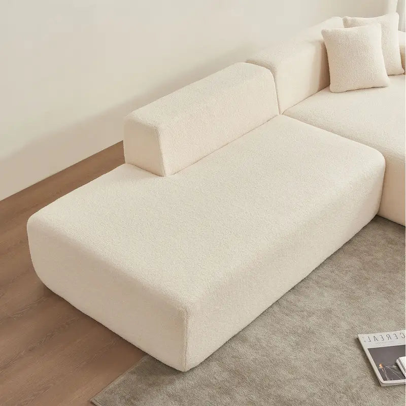 105.51 Divano componibile moderno a L con 5 posti e chaise longue, in morbido tessuto Sherpa "lana d'agnello"