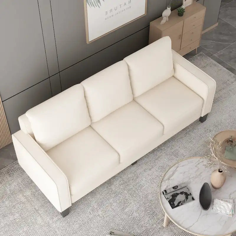 Divano in tessuto beige con bracciolo squadrato e schienale trapuntato
