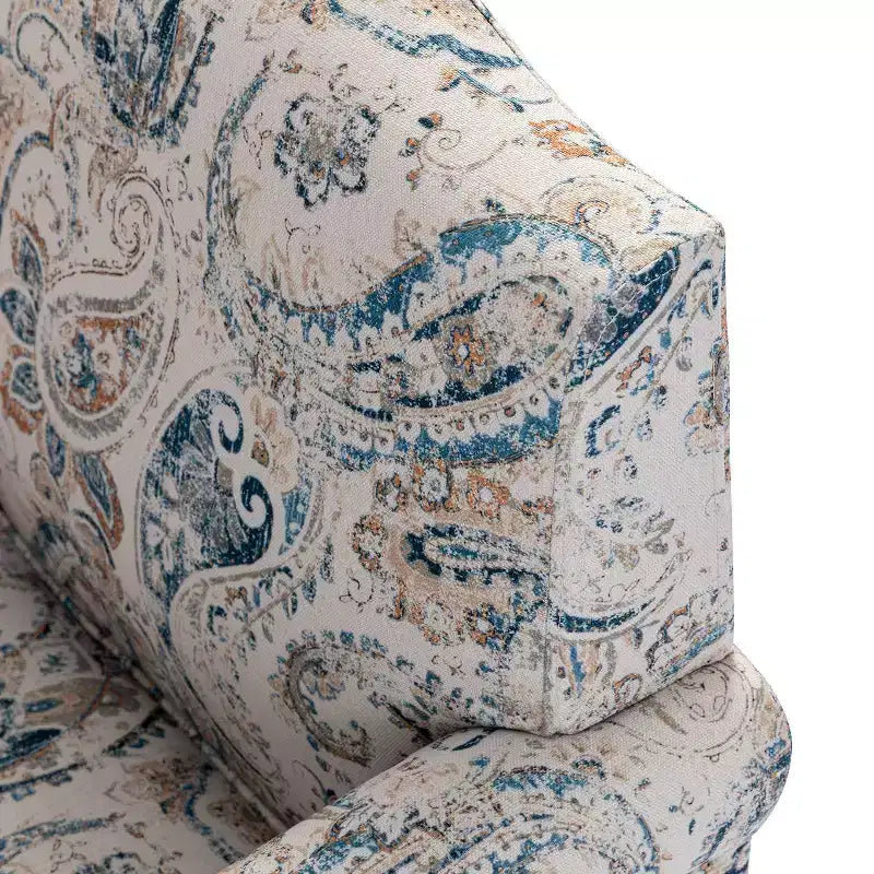 Poltrona transizionale Yahweh in legno e tappezzeria con fantasia floreale, braccioli a pannello e schienale a gobba di cammello | ART OF LIVING DESIGNS