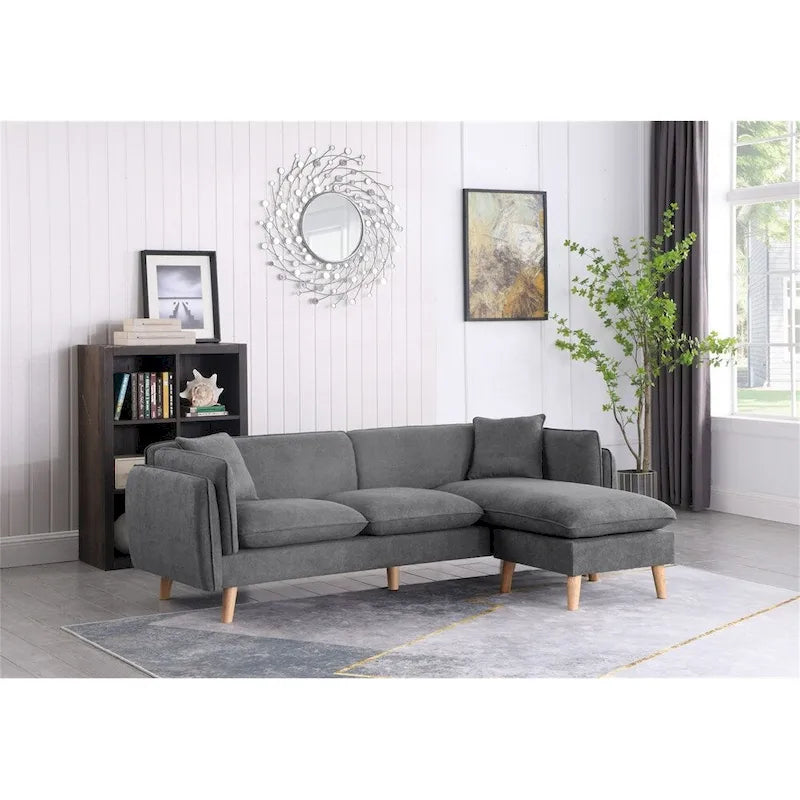 Divano componibile in tessuto con chaise longue e gambe affusolate